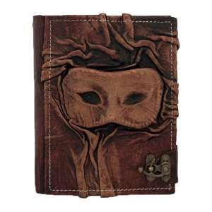 3D Happy Sad Mask Sculpture on a Brown Handmade Leather Bound Journal 