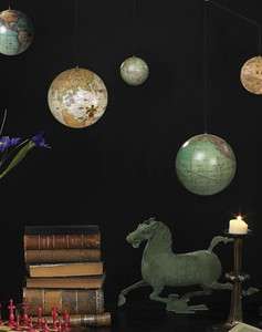 Each of the five decorative terrestrial globe models is handcrafted 