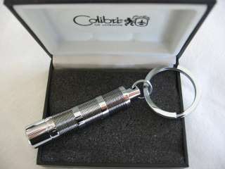   REACTOR POLISHED SILVER WITH BLACK LINES CIGAR PUNCH CUTTER KEY RING