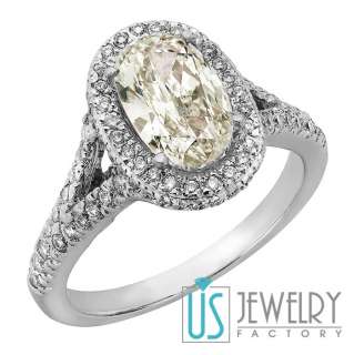   oval shape diamond engagement ring split shank design 18k white gold
