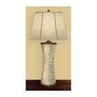 motif finish an off white linen shade completes this striking lamp