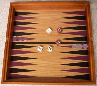 The set also includes a beautiful wood backgammon board set measuring 